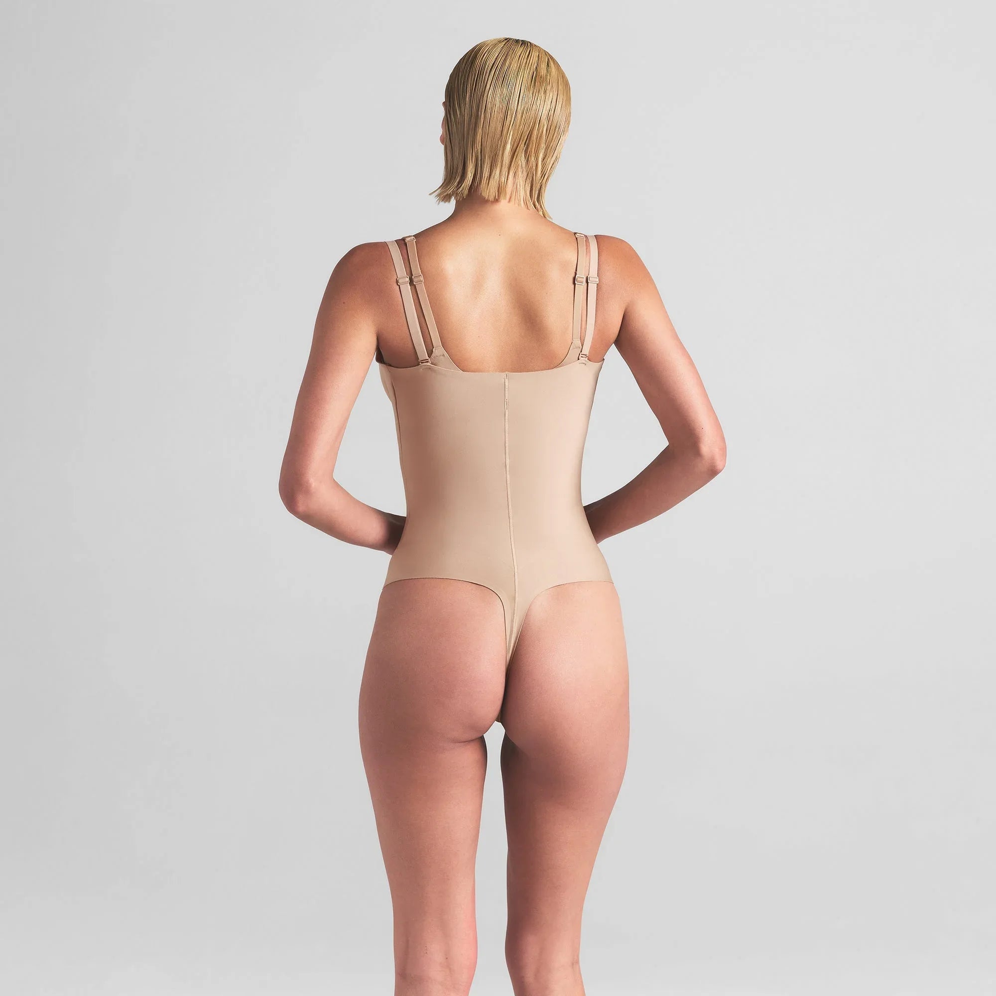 SKIMS BODY CORE SCULPT OPEN BUST THONG BODYSUIT | CLAY - TANGA - My Suti