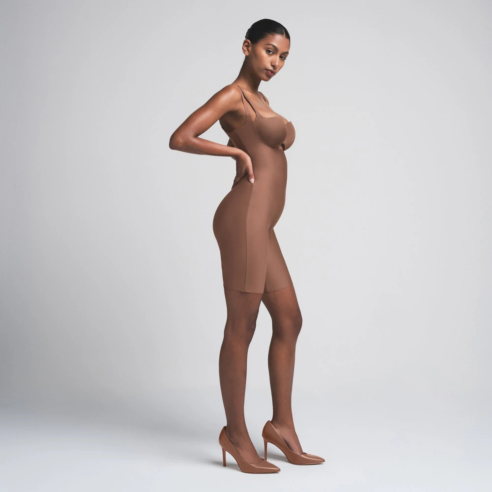 SKIMS BODY BUTT ENHANCING OPEN BUST PADDED BODYSUIT | JASPER - BODYSUIT - My Suti