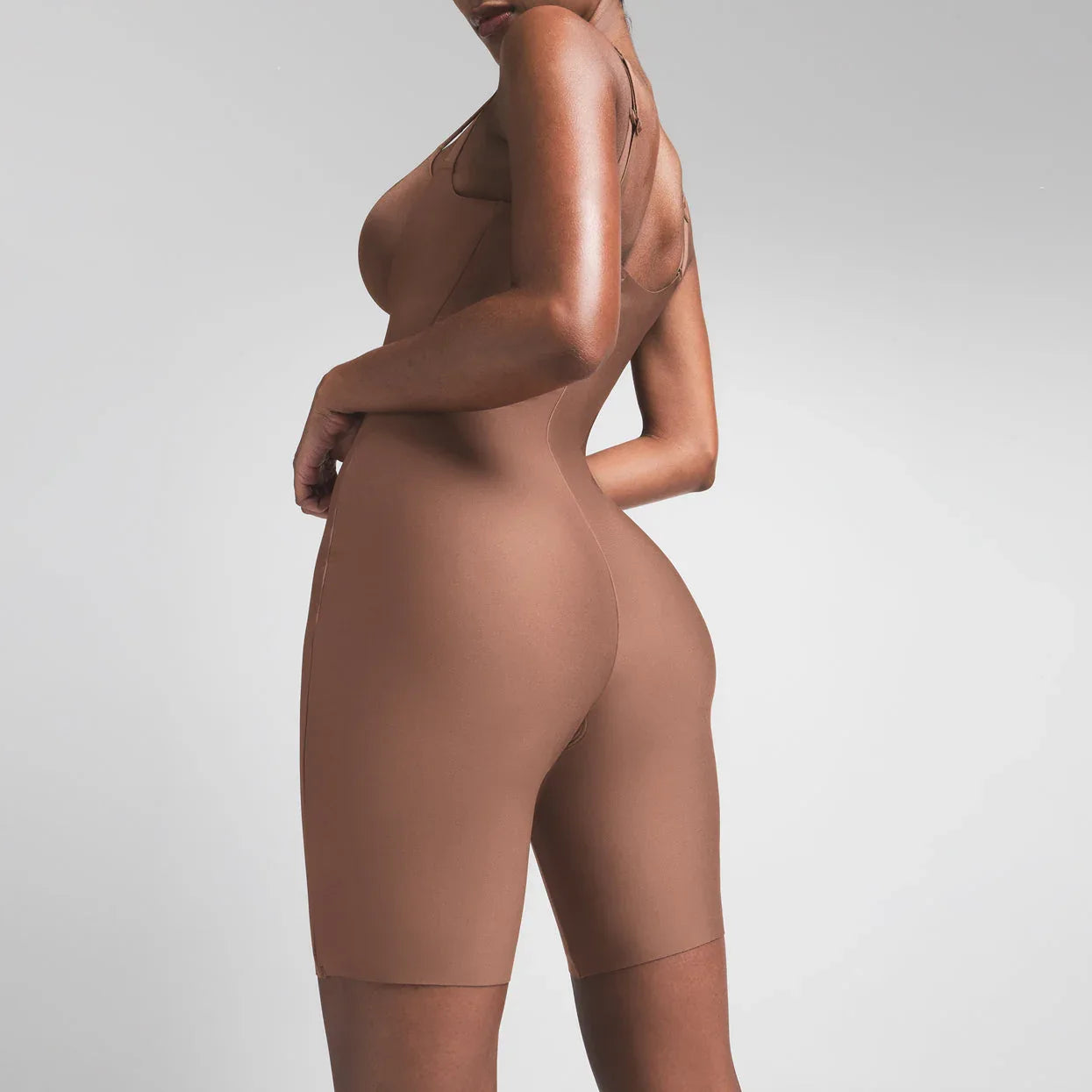 SKIMS BODY BUTT ENHANCING OPEN BUST PADDED BODYSUIT | JASPER - BODYSUIT - My Suti