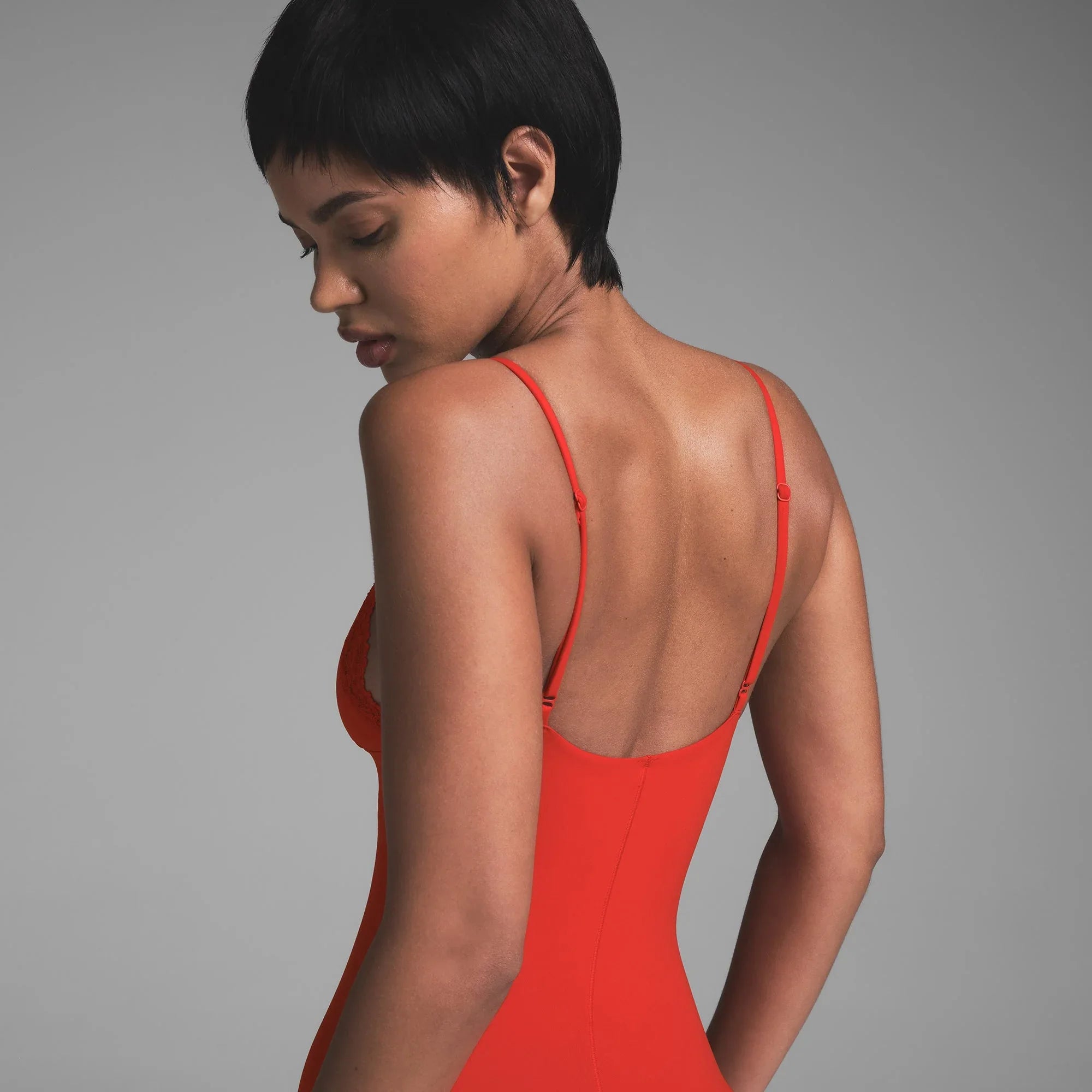 SKIMS FITS EVERYBODY LACE TRIANGLE ONESIE | CAYENNE - ONESIE - My Suti