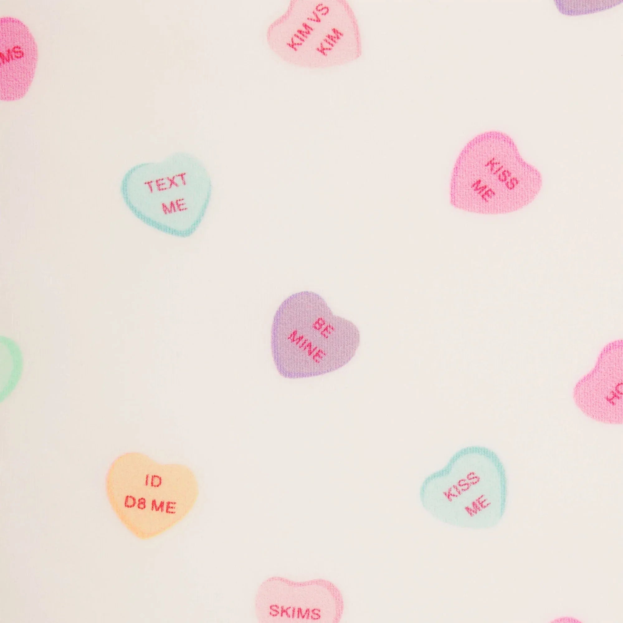 SKIMS FITS EVERYBODY LACE TRIANGLE ONESIE | MARBLE CANDY HEART PRINT - ONESIE - My Suti