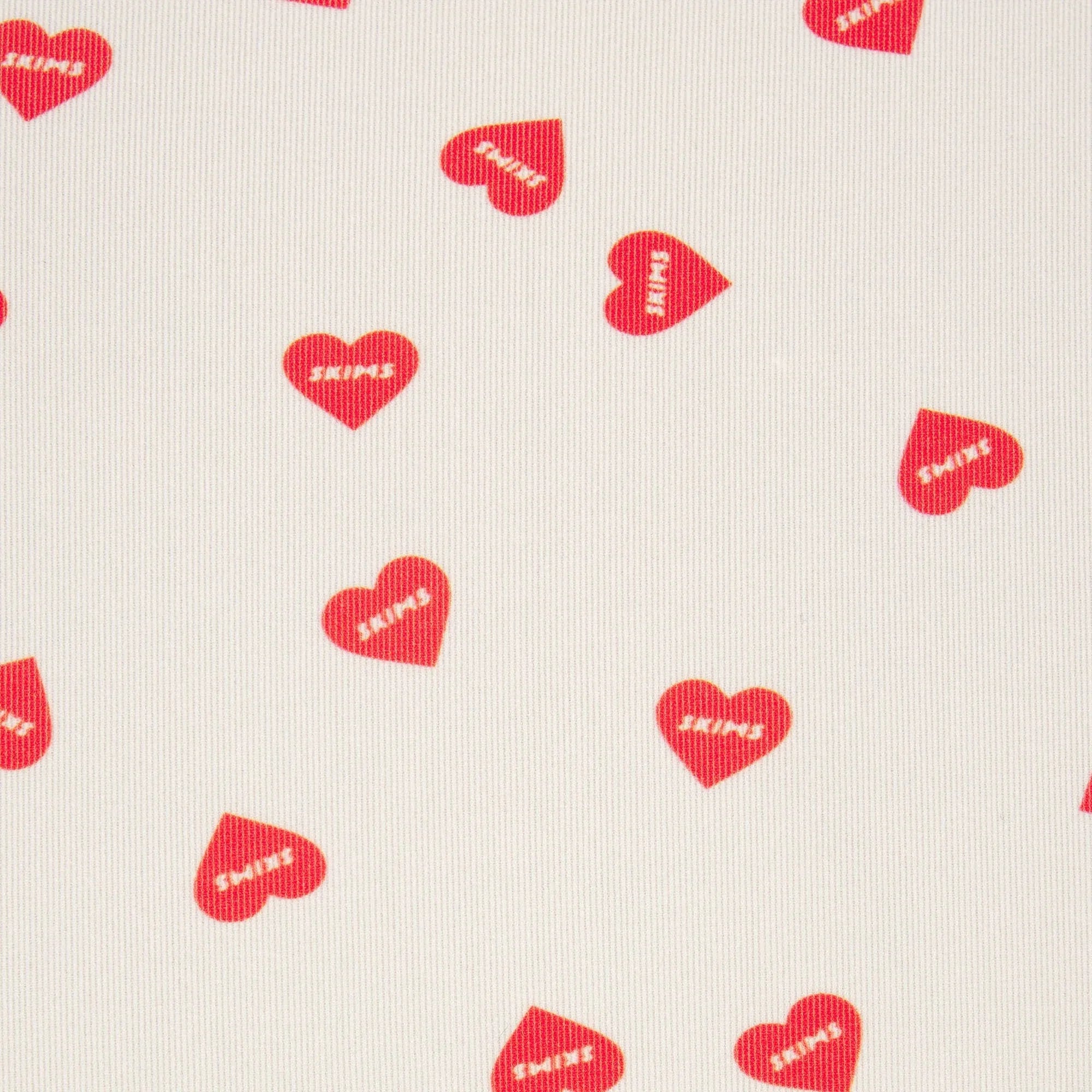 SKIMS FITS EVERYBODY PICOT ONESIE | RUBY HEART PRINT - TULUM - My Suti