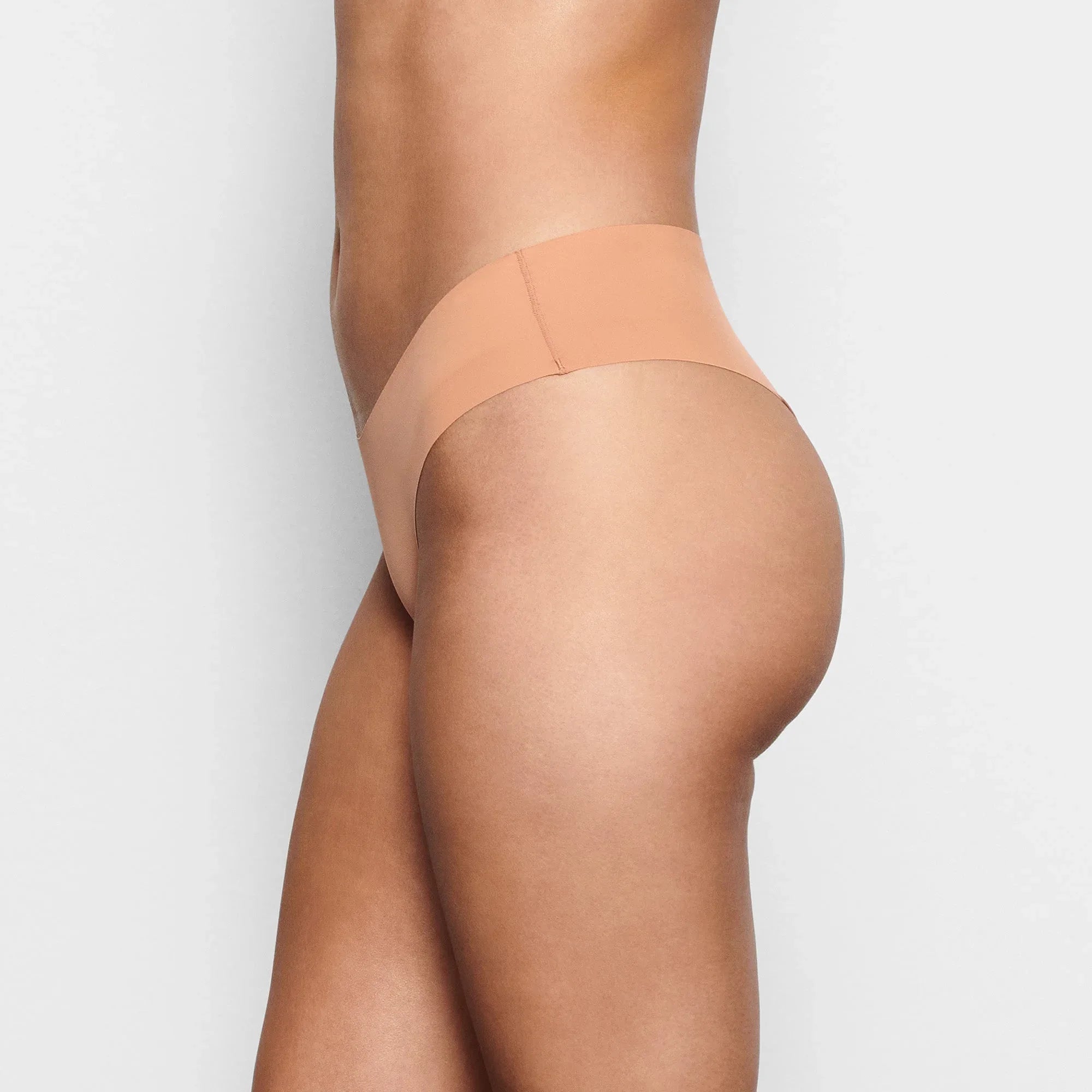 SKIMS NAKED CHEEKY HIPSTER | OCHRE - TAYT - My Suti