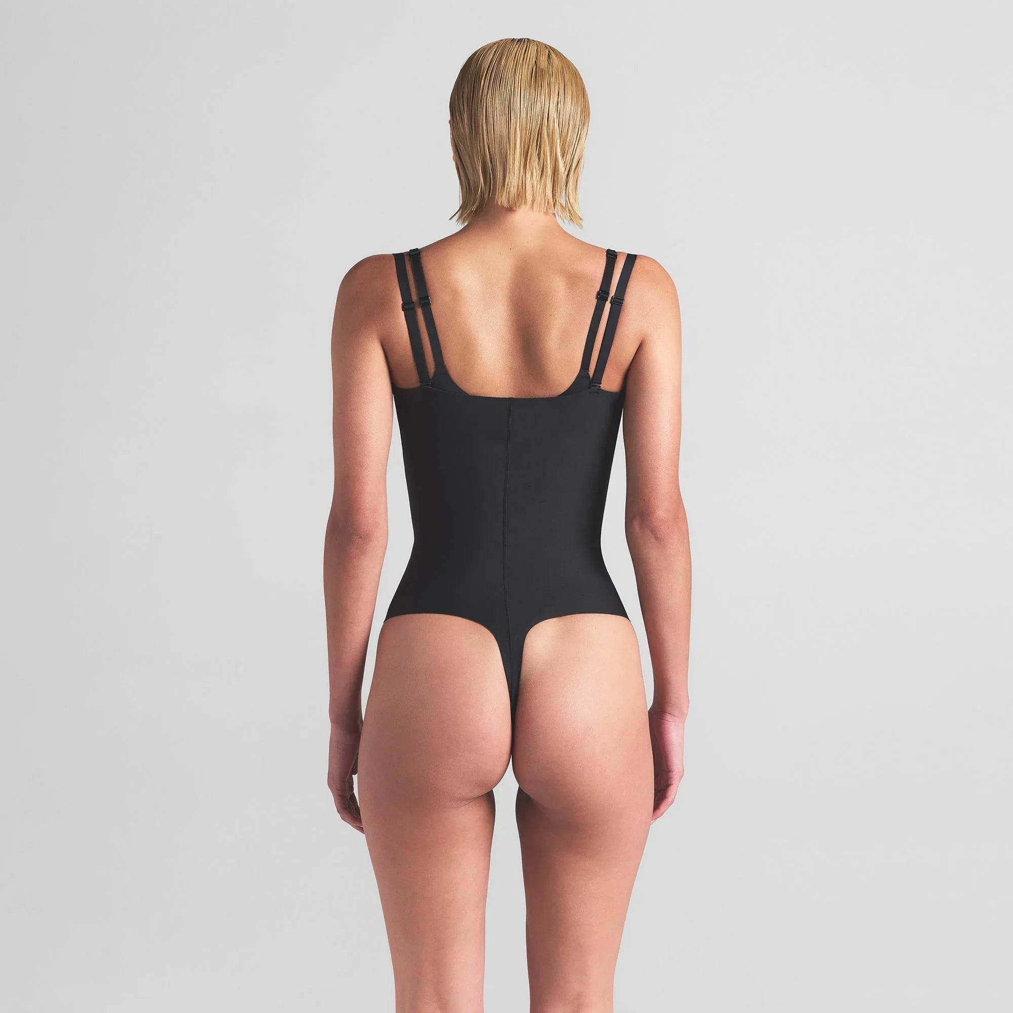 SKIMS BODY CORE SCULPT OPEN BUST THONG BODYSUIT | ONYX - BODY - My Suti