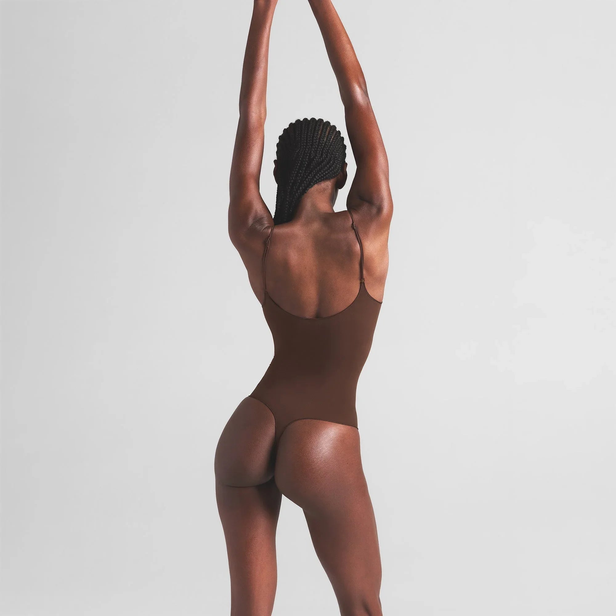 SKIMS SHEER SEAMLESS THONG BODYSUIT | COCOA - BODYSUIT - My Suti