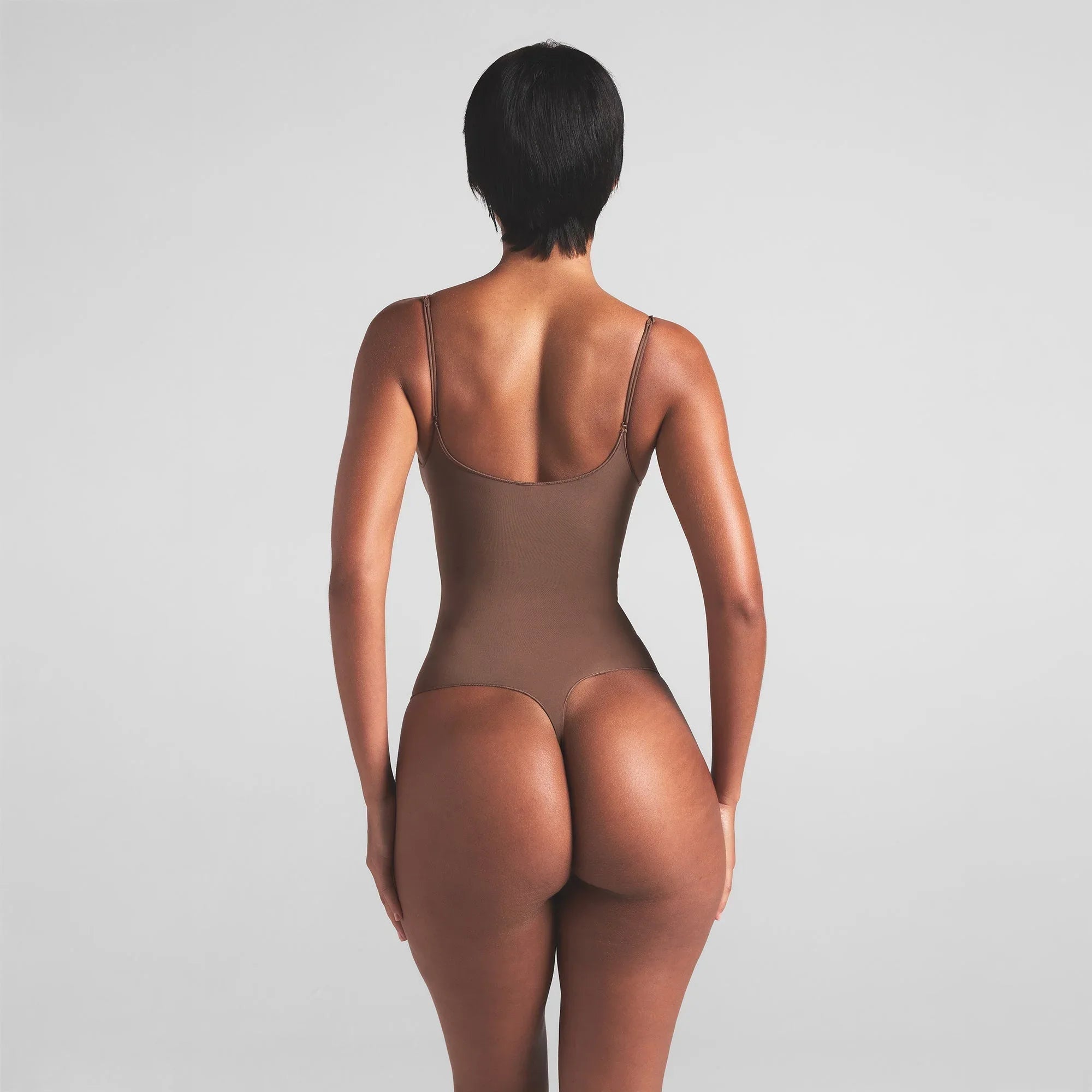 SKIMS SHEER SEAMLESS THONG BODYSUIT | JASPER - BODYSUIT - My Suti