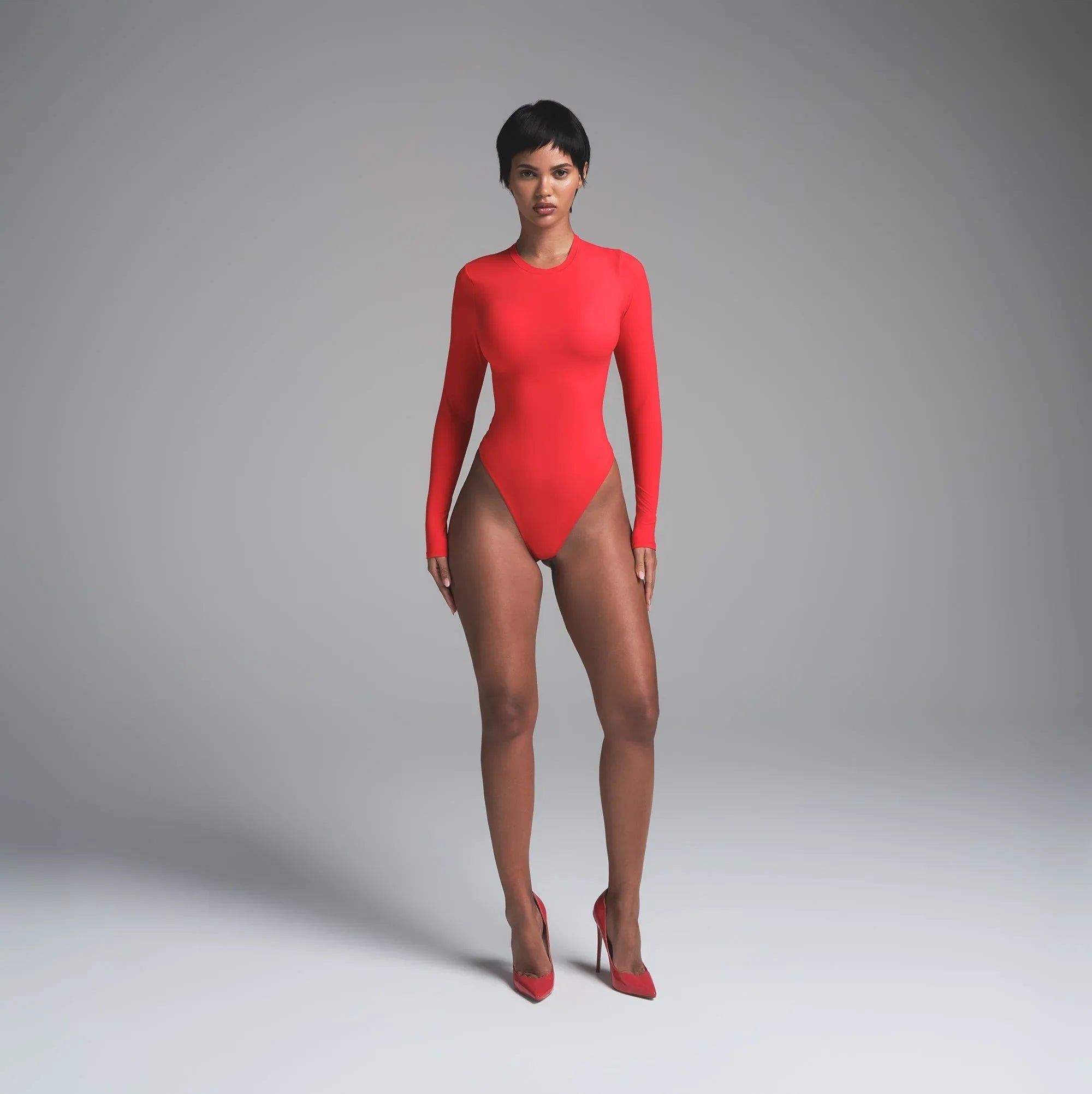 SKIMS FITS EVERYBODY LONG SLEEVE CREW NECK BODYSUIT | CHERRY - BODYSUIT - My Suti