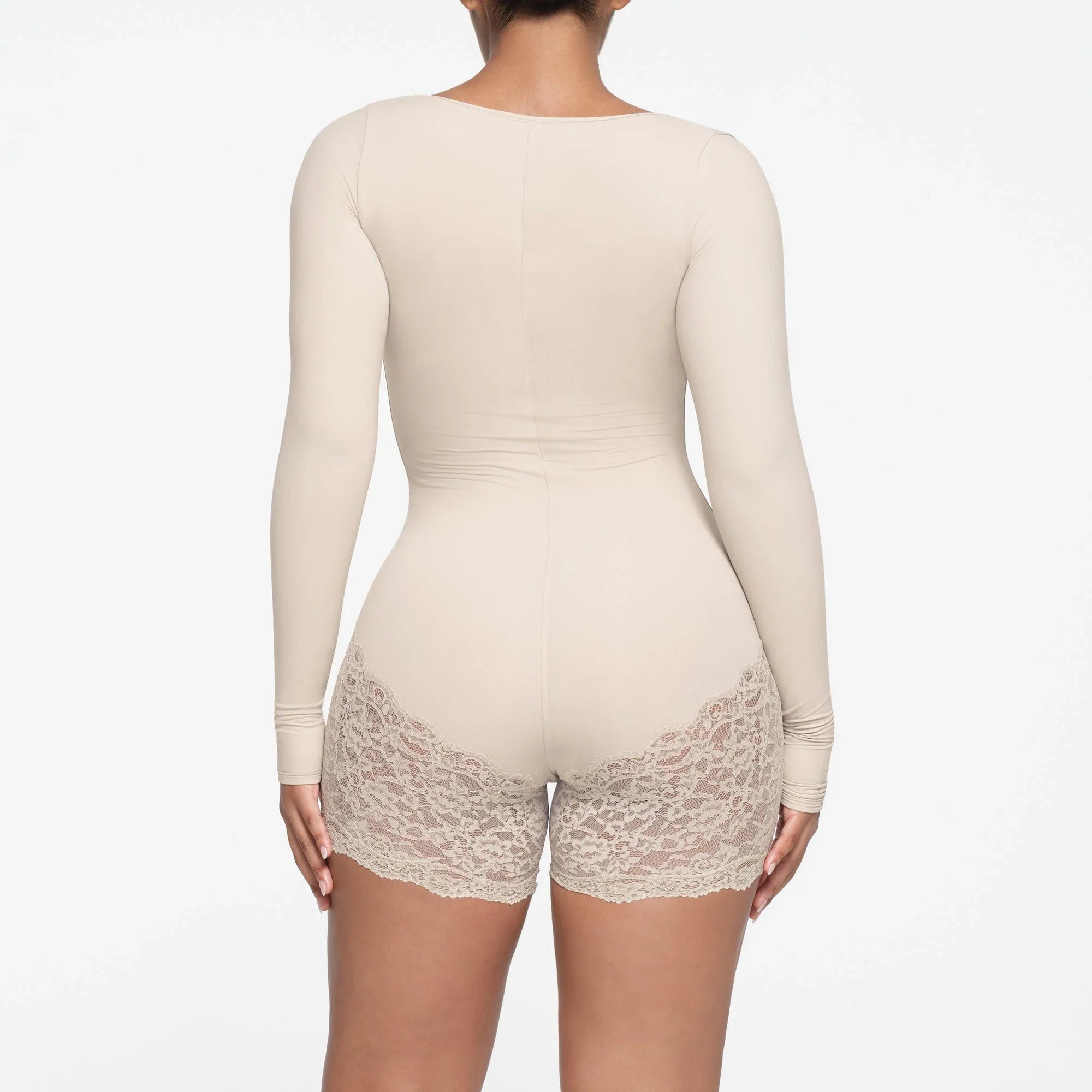 SKIMS FITS EVERYBODY LACE LONG SLEEVE ONESIE | STONE - TULUM - My Suti